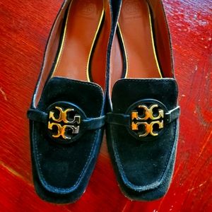 Well worn Tory Burch loafers